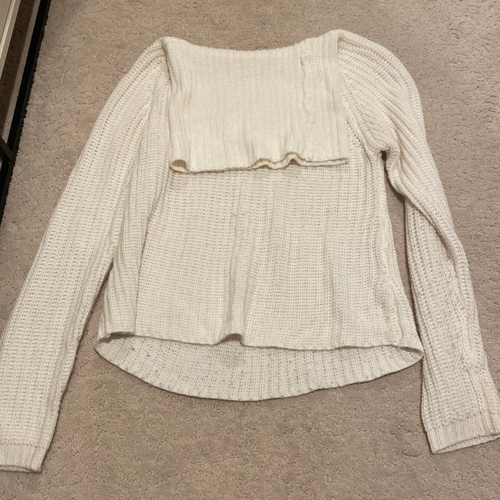 Francesca’s white mock neck sweater